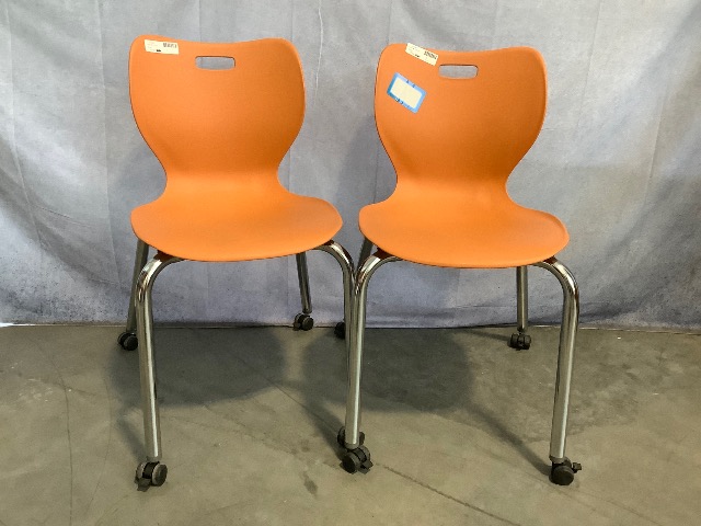 Lot of 2 Orange Rolling Chairs