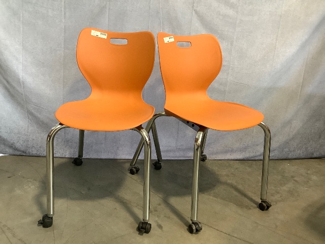 Lot of 2 Rolling Orange Chairs